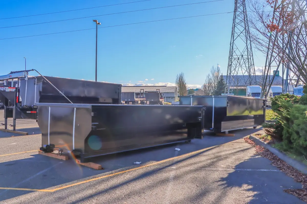 Roll-off dumpster ready for waste disposal at job site for Concrete Dumpster Rental in Waveland